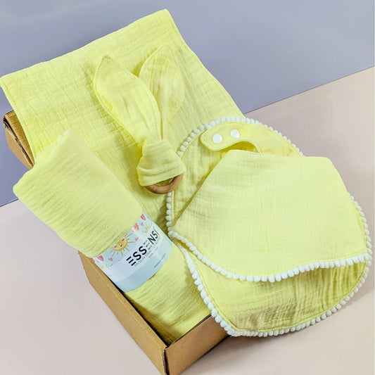 Newborn Baby Gift Hamper | 100% Muslin Cotton Essentials Set with Swaddle, Bibs, Burp Cloth & Teether | Baby Shower Gift Basket for Boys & Girls (Yellow)