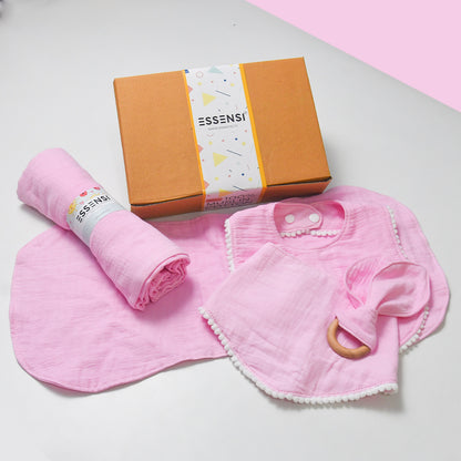 Newborn Baby Gift Hamper | 100% Muslin Cotton Essentials Set with Swaddle, Bibs, Burp Cloth & Teether | Baby Shower Gift Basket for Boys & Girls (Pink)