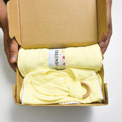 Newborn Baby Gift Hamper | 100% Muslin Cotton Essentials Set with Swaddle, Bibs, Burp Cloth & Teether | Baby Shower Gift Basket for Boys & Girls (Yellow)