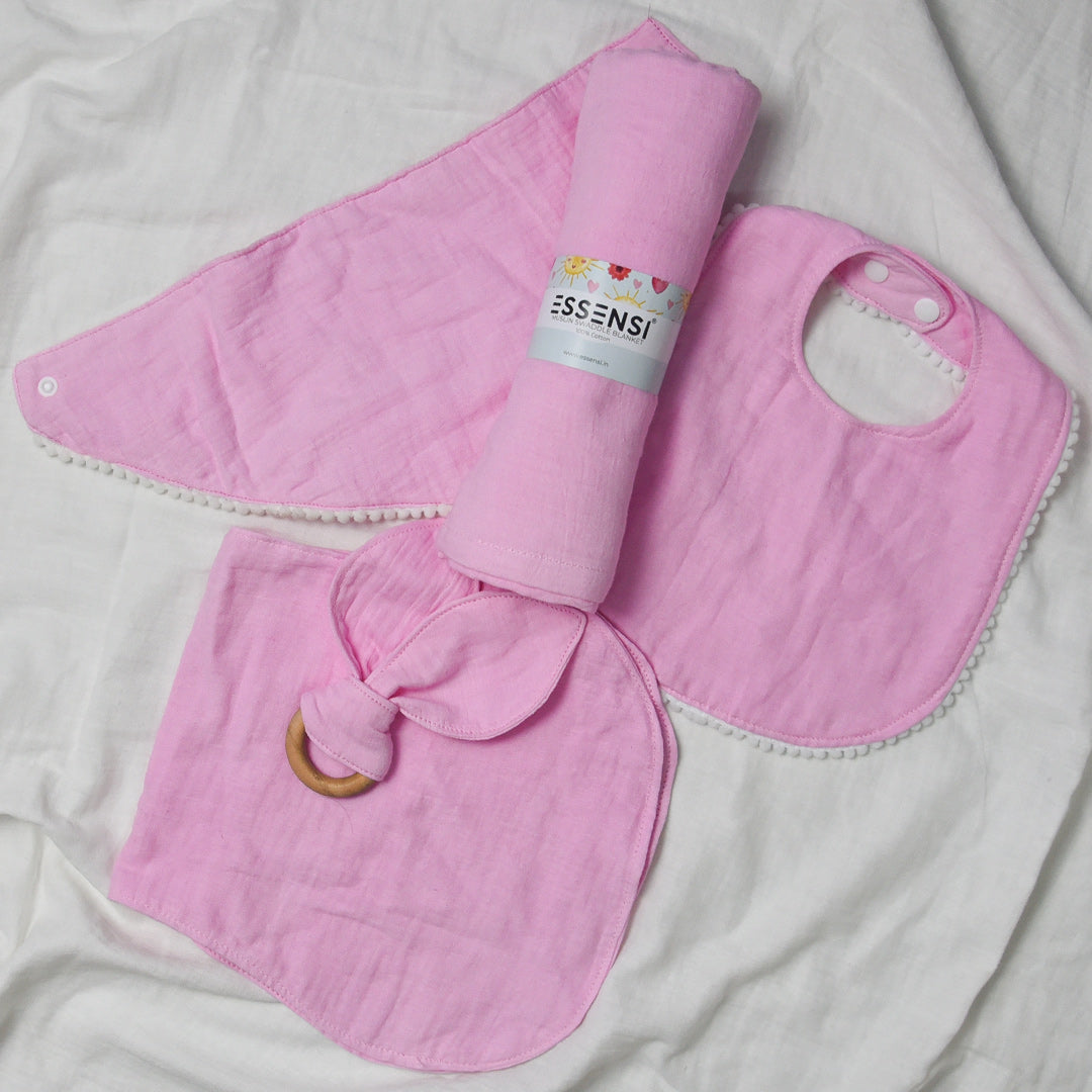 Newborn Baby Gift Hamper | 100% Muslin Cotton Essentials Set with Swaddle, Bibs, Burp Cloth & Teether | Baby Shower Gift Basket for Boys & Girls (Pink)