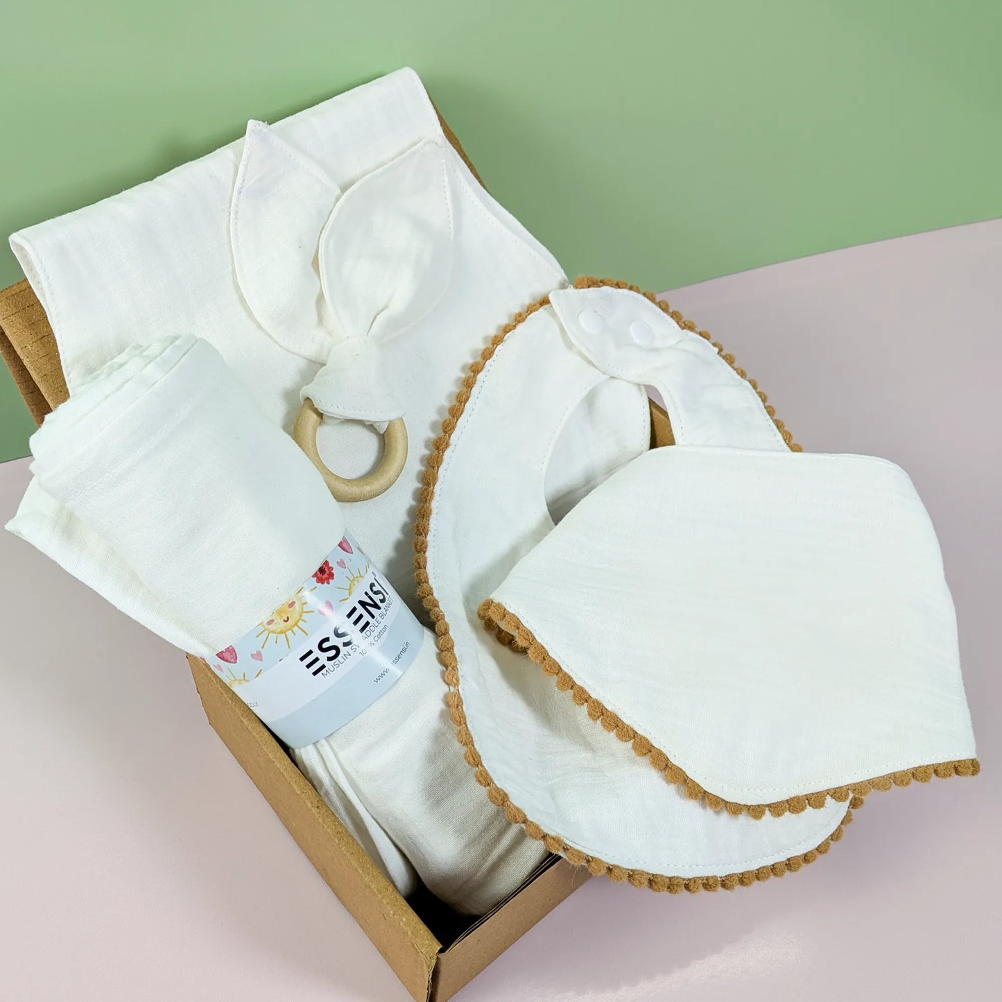 Newborn Baby Gift Hamper | 100% Muslin Cotton Essentials Set with Swaddle, Bibs, Burp Cloth & Teether | Baby Shower Gift Basket for Boys & Girls (White)